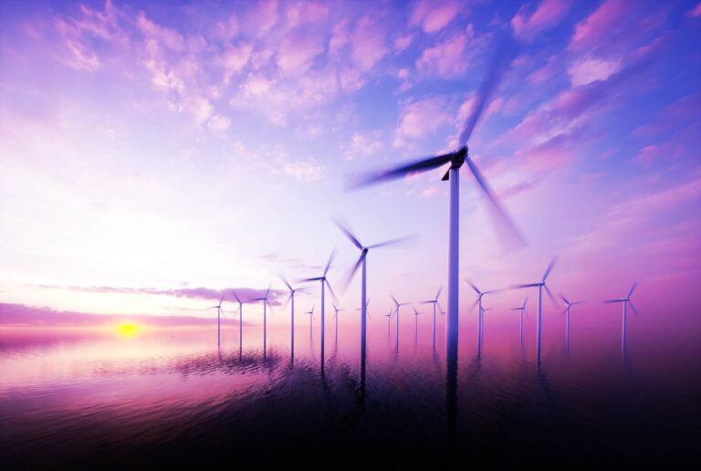 Offshore wind turbines at sunrise