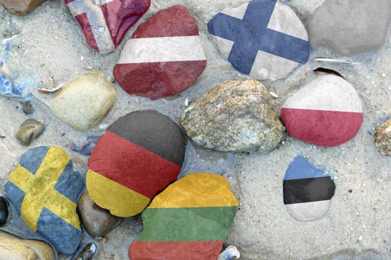Stones painted with the flags from the countries surrounding the Baltic Sea.