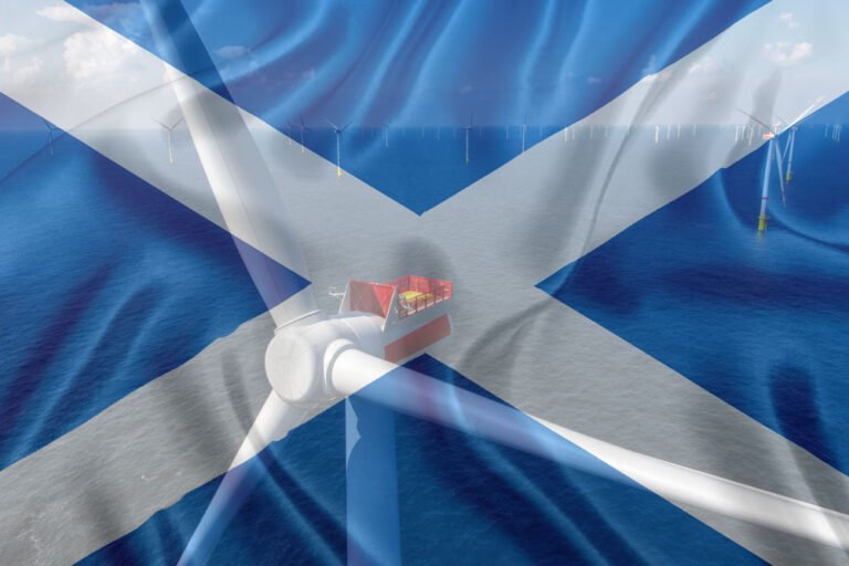 Offshore wind turbines with Scottish flag overlay.