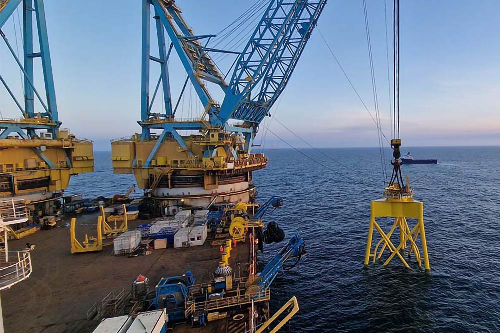 The world’s deepest wind turbine foundation being installed at what will be Scotland’s largest offshore wind farm.